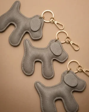 Charm de Piel Puppy Taupe